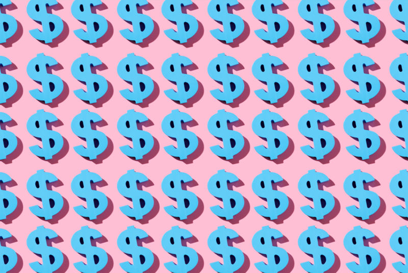 Blue dollars on pink bankground